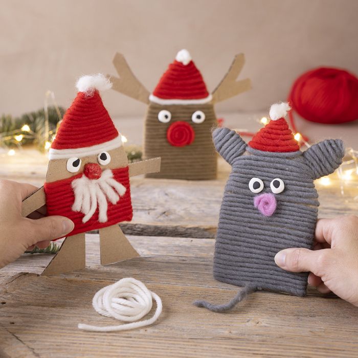 Weihnachtsfiguren aus Karton und Garn