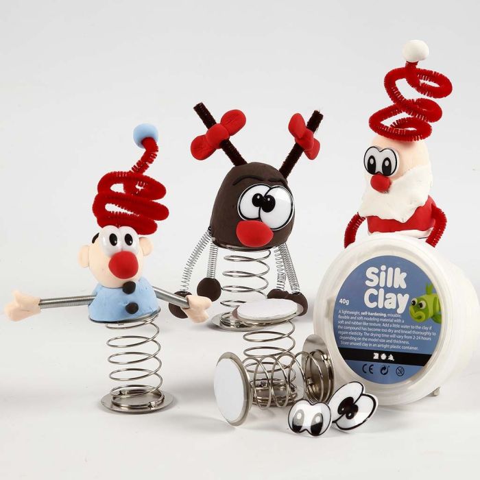 Weihnachtsfiguren aus Silk Clay mit Sprungfeder