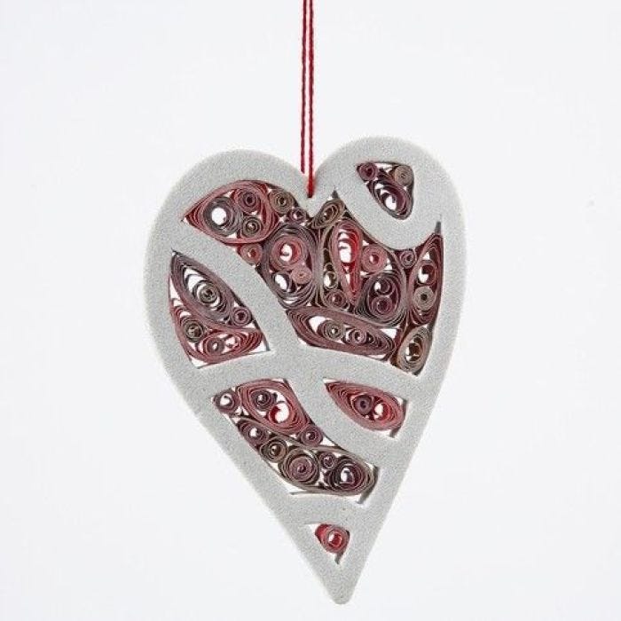 Quilling in einem Herzrahmen