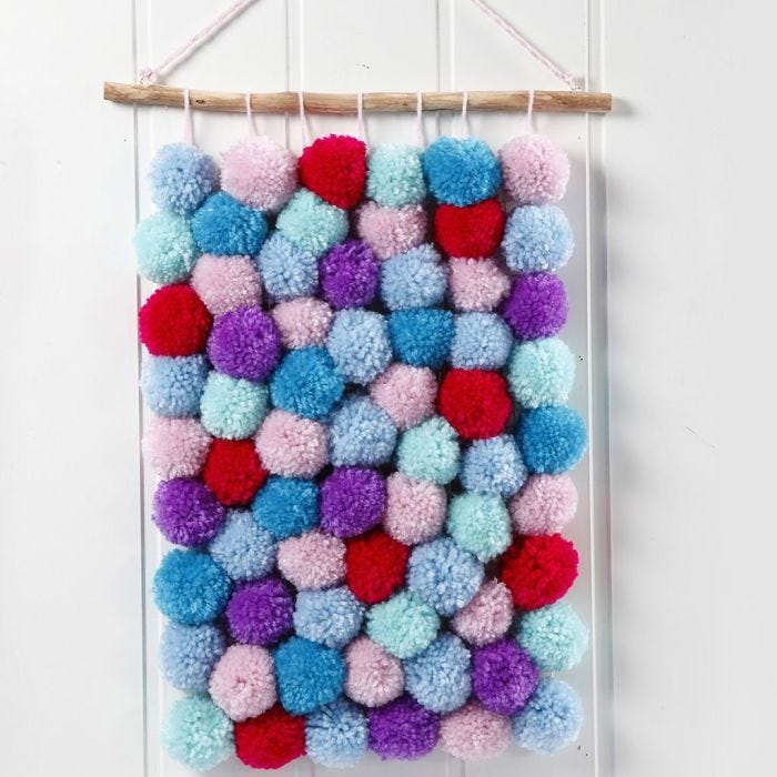 Wandbehang aus Pompons