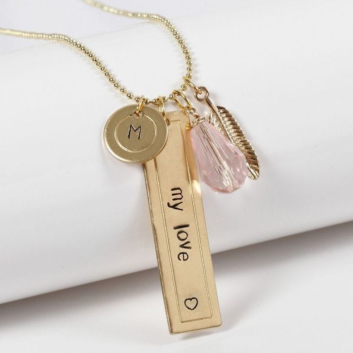 Personalisierter, geprägter Schmuck aus Metall