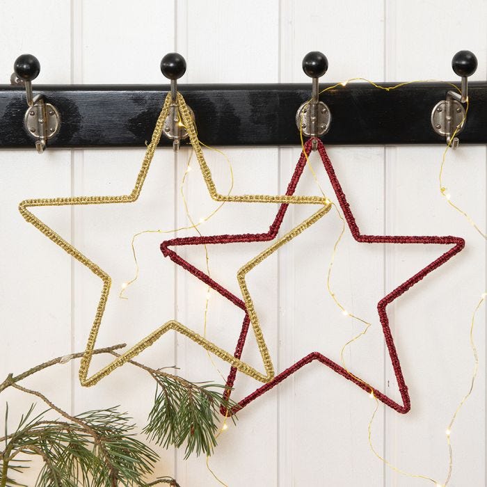 Auf Metalldraht gehäkelter Weihnachtsstern