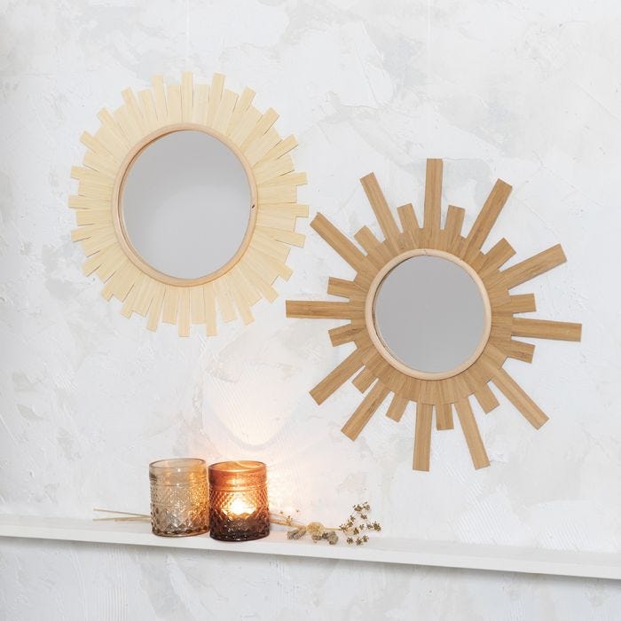 A mirror decorated like the sun using wood veneer