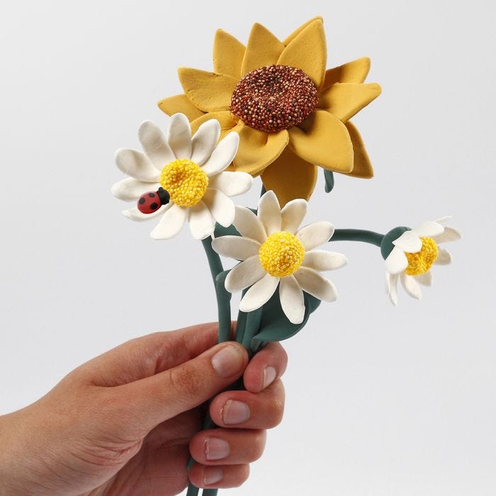 Sonnenblumen und Gänseblümchen aus Silk Clay