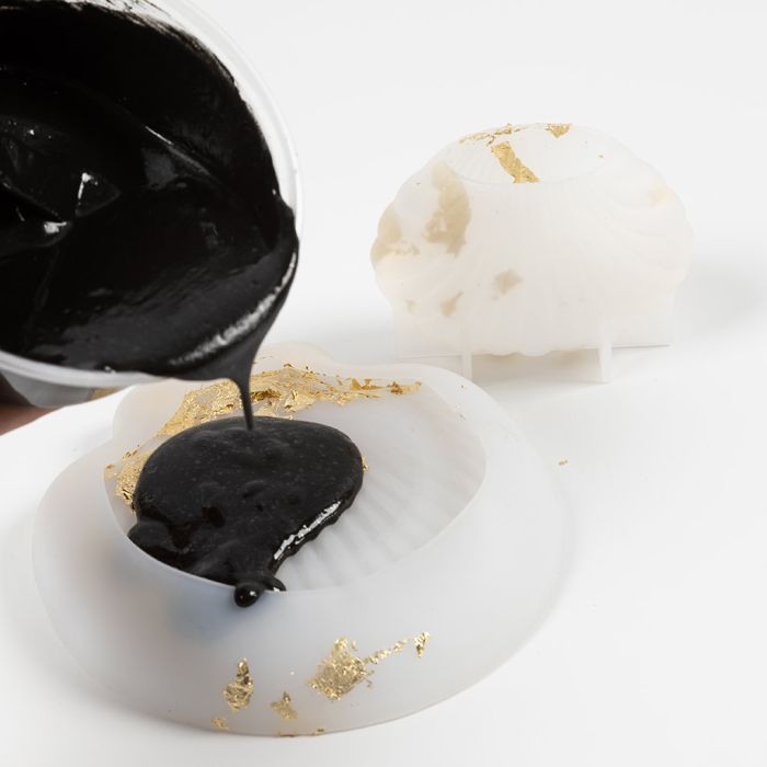 So machen Sie Güsse mit schwarzer Kunstharzguss-Mischung.