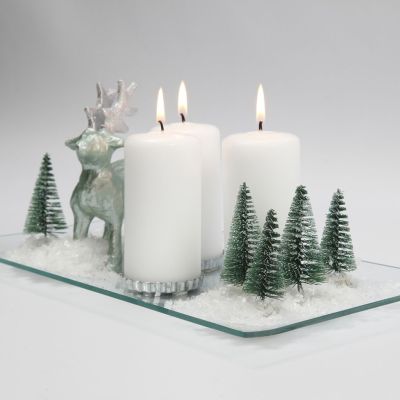 Weihnachtliche Schneelandschaft mit Kerzen