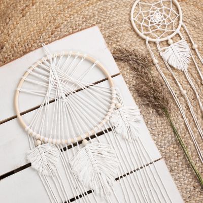 A homemade macram&eacute; dream catcher