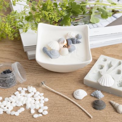 Kerzenteller mit Strandmuscheln