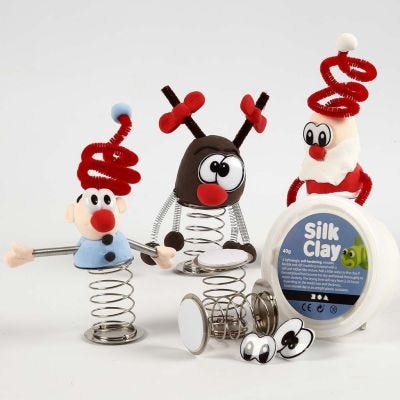 Weihnachtsfiguren aus Silk Clay mit Sprungfeder