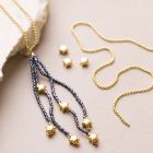 Troddel aus Rocaille Seed Beads an einer Halskette mit Rocaille Seed Bead-Blüten und Stern-Spacer Beads